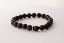 10karat yellow gold cheerio with black matte onyx